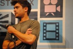 Zac Efron addresses the audience after a screening of his movie "At Any Price" at The Paramount Theater.